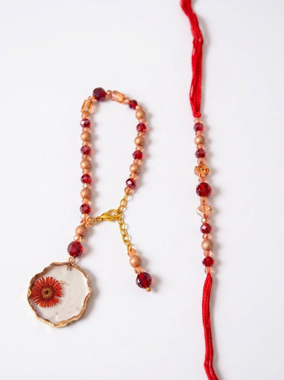 NVR Set of 2 Gold Toned Red Artificial Beads Bhaiya Bhabhi Rakhi With Roli Chawal Chandan