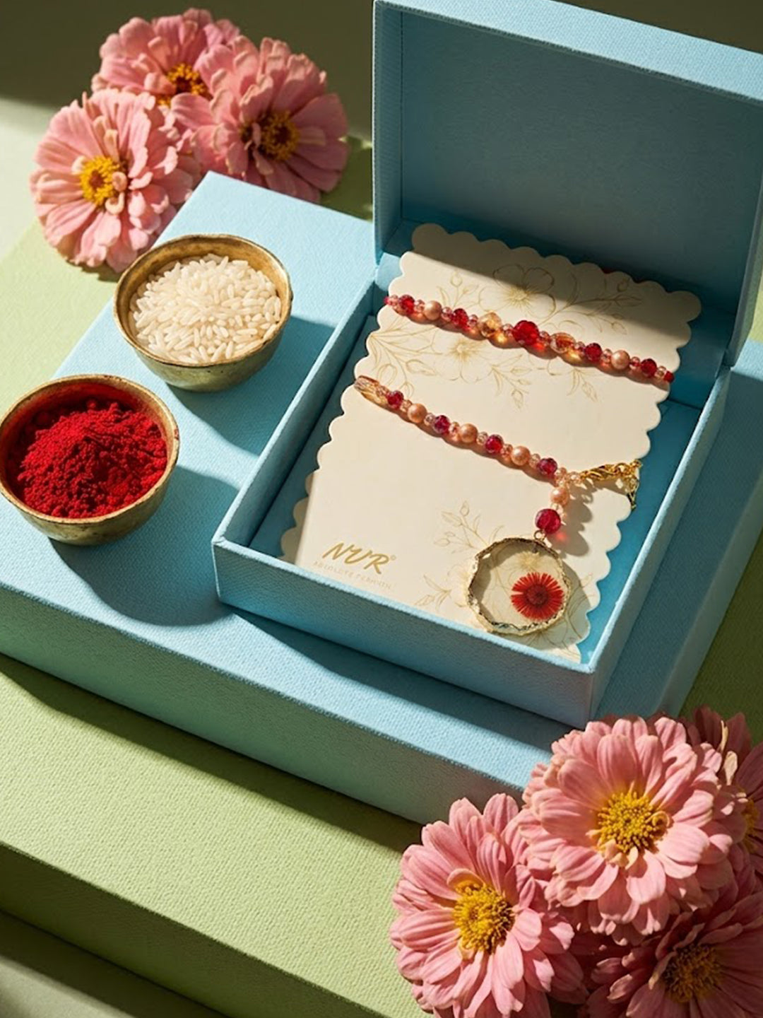 NVR Set of 2 Gold Toned Red Artificial Beads Bhaiya Bhabhi Rakhi With Roli Chawal Chandan