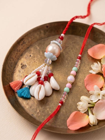 NVR Set of 2 Multicolor Artificial Beads & Sea Shell Bhaiya Bhabhi Rakhi with Roli Chawal