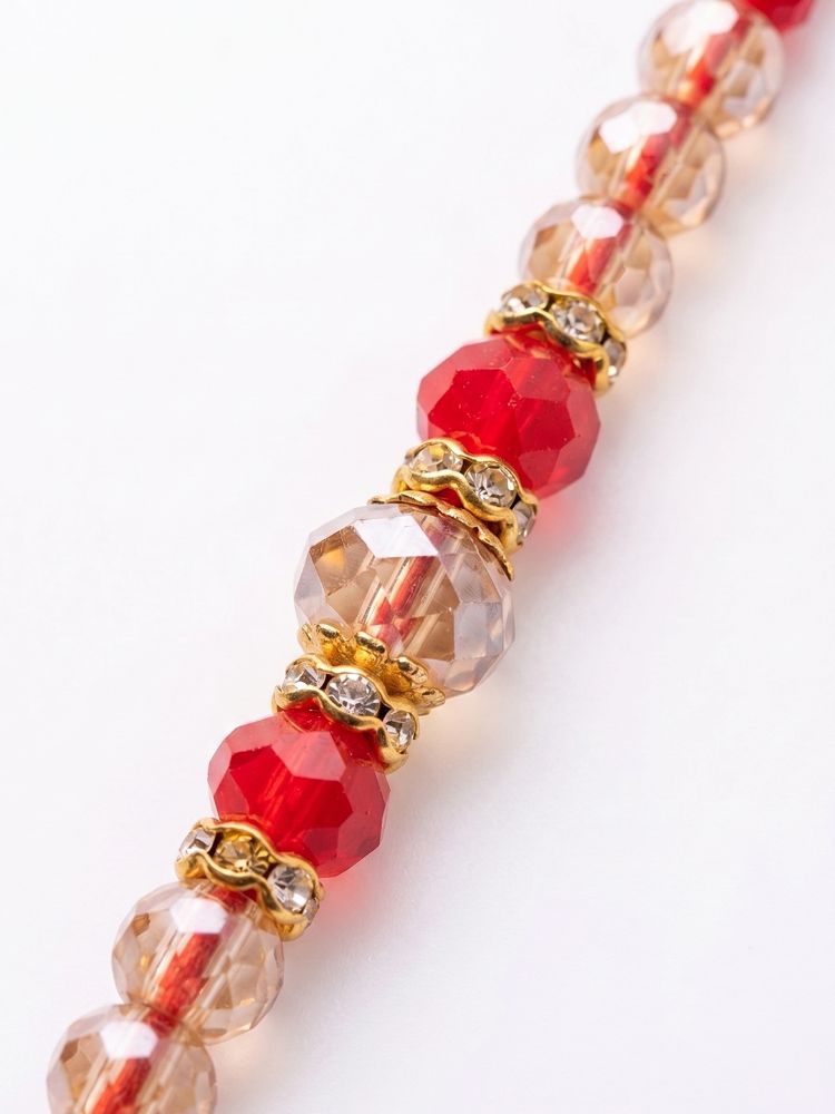 NVR Set of 2 Gold Toned Artificial Stones & Beads Bhaiya Bhabhi Rakhi with Roli Chawal
