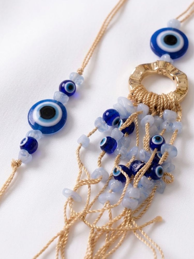 NVR Set of 2 Gold Toned Round Evil Eye Bhaiya Bhabhi Rakhi with Roli Chawal Chandan Mishri