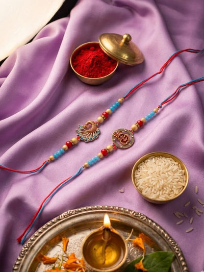 NVR Set of 2 Multicolor Artificial Beads Thread Rakhi with Roli Chawal Chandan Mishri