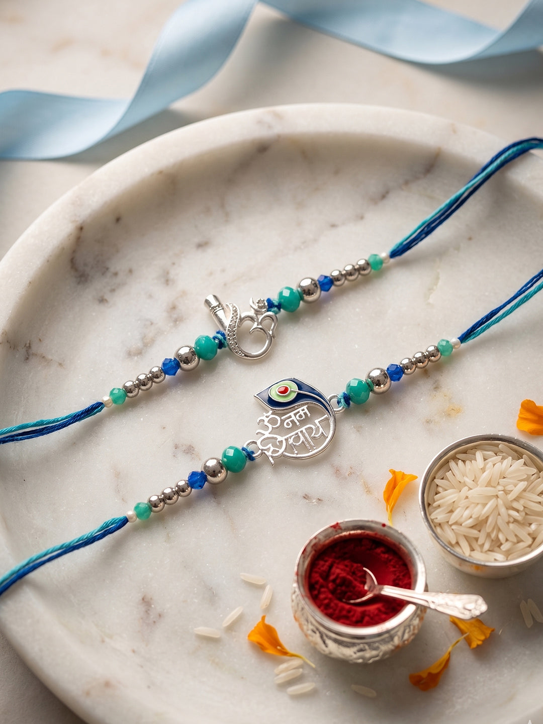 NVR Set of 2 Silver Toned Beaded Religious Thread Rakhi with Roli Chawal Chandan Mishri
