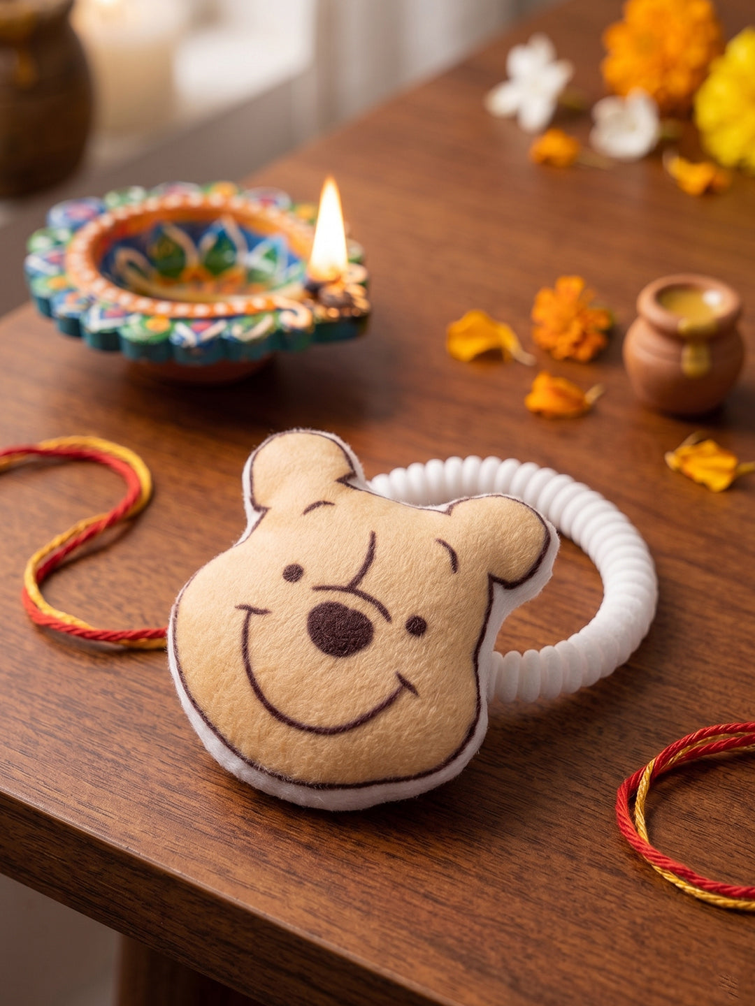NVR Kids Pooh Character Artificial Beads Rakhi with Roli Chawal Chandan Mishri
