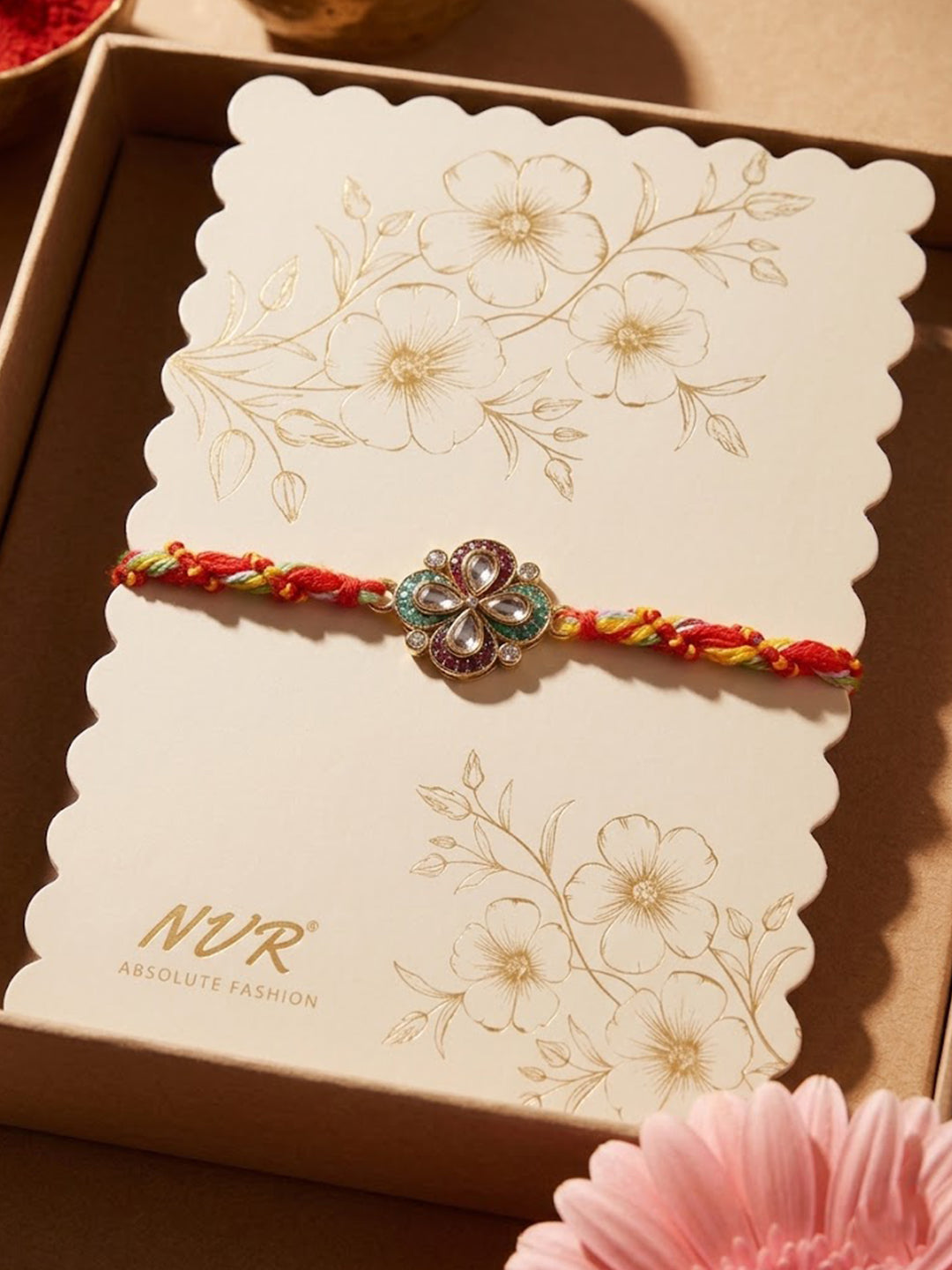 NVR Traditional Artificial Stones Thread Rakhi with Roli Chawal Chandan Mishri