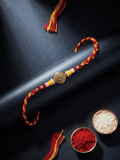 NVR Artificial Beads Decorative Om Design Religious Thread Rakhi with Roli Chawal Chandan