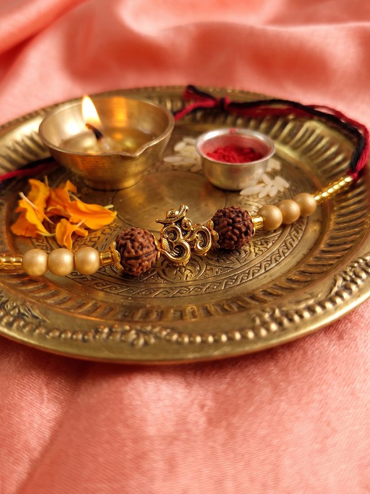NVR Om Design Rudraksh Thread Rakhi with Roli Chawal Chandan Mishri