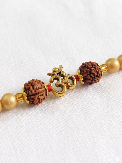 NVR Om Design Rudraksh Thread Rakhi with Roli Chawal Chandan Mishri