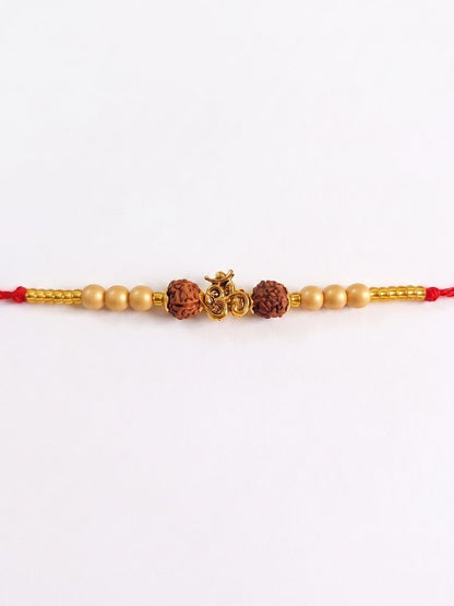 NVR Om Design Rudraksh Thread Rakhi with Roli Chawal Chandan Mishri