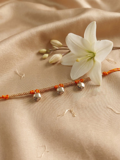 NVR Golden Ghungroo Thread Rakhi with Roli Chawal Chandan Mishri