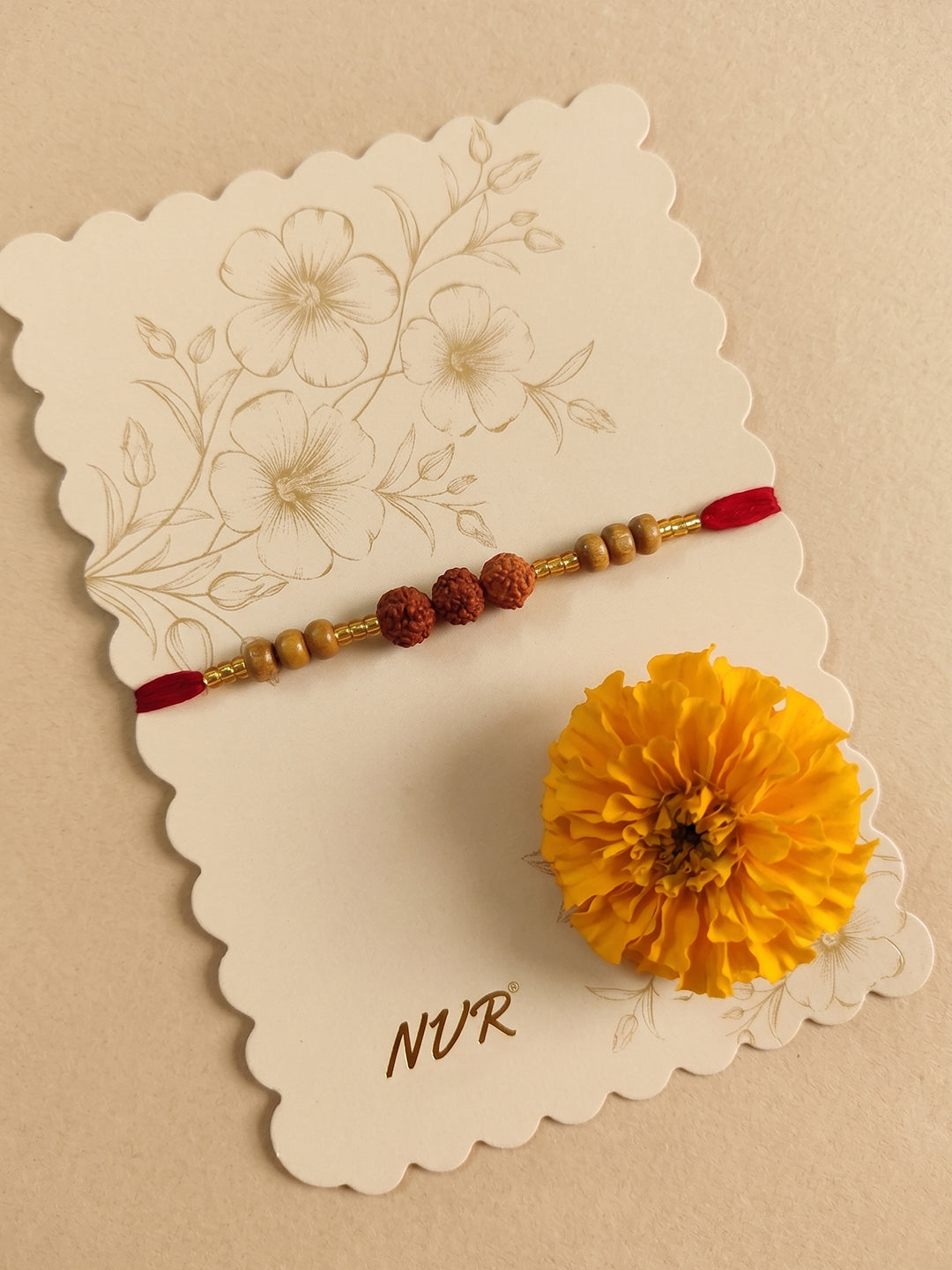 NVR Religious Rudraksh & Red Thread Rakhi with Roli Chawal Chandan Mishri