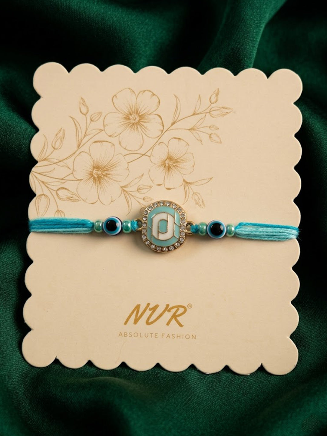 NVR Blue Evil Eye & Artificial Stones Oval Shape Thread Rakhi with Roli Chawal Chandan