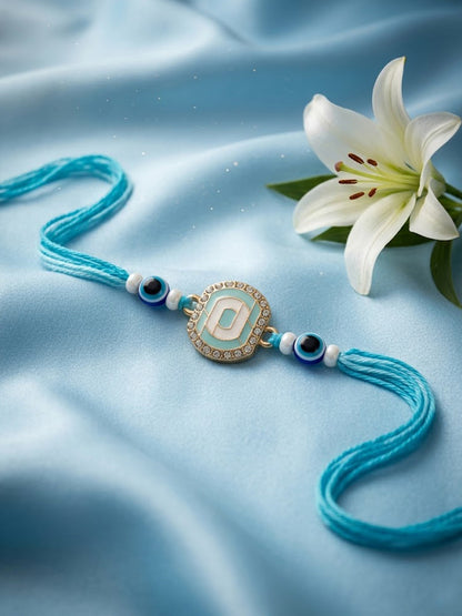 NVR Blue Evil Eye & Artificial Stones Oval Shape Thread Rakhi with Roli Chawal Chandan
