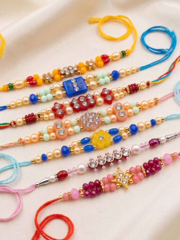 NVR Set of 7 Multicolor Designer Thread Rakhi with Roli Chawal Chandan Mishri