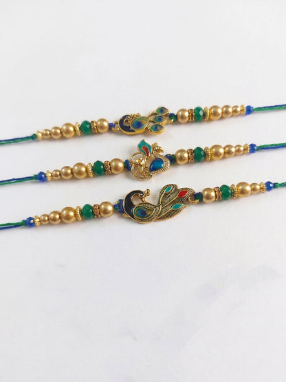 NVR Set of 3 Peacock Design Multicolor Artificial Beads Thread Rakhi With Roli Chawal