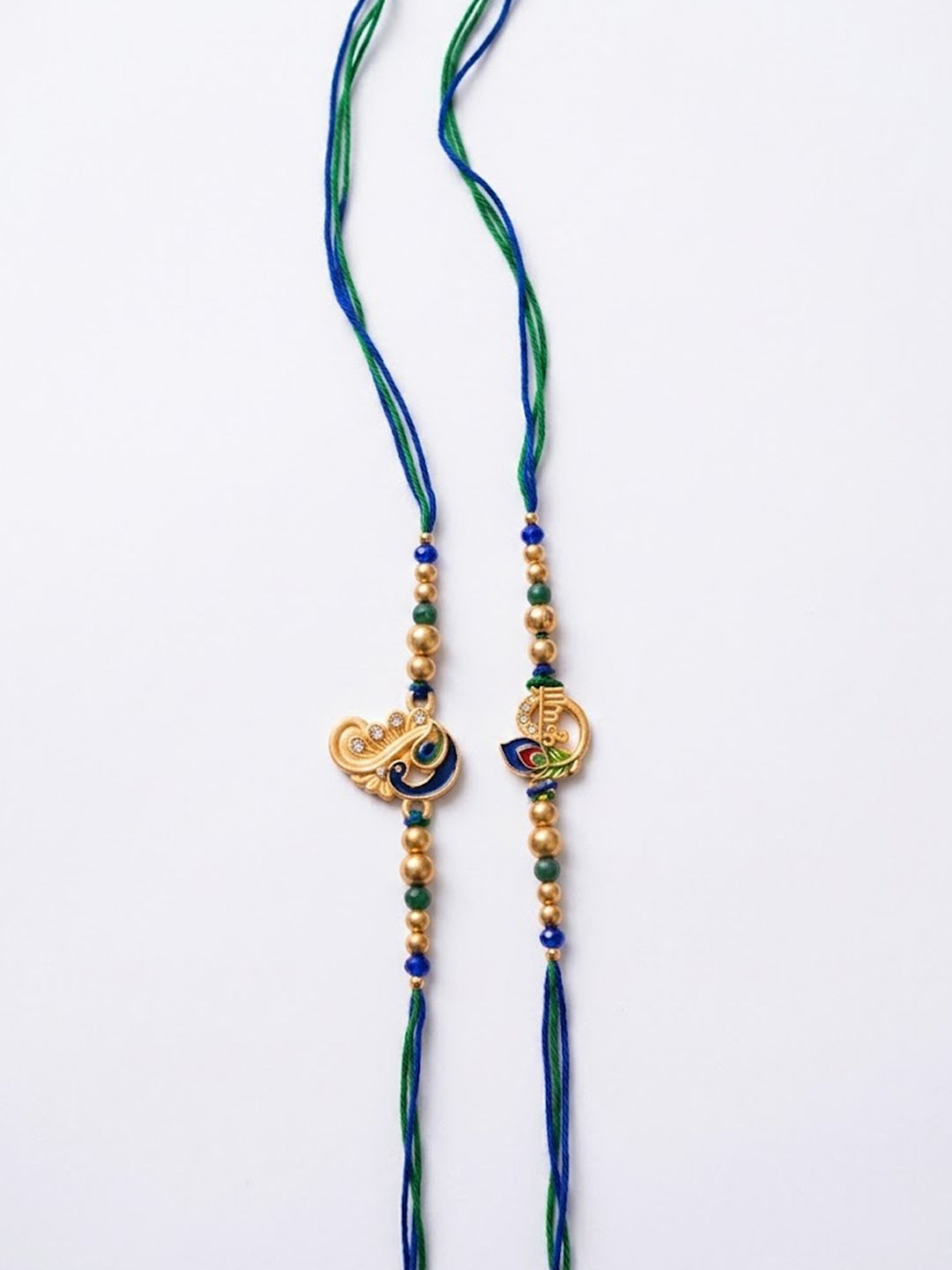 NVR Set of 2 Krishna & Peacock Design Artificial Beads Thread Rakhi With Roli Chawal