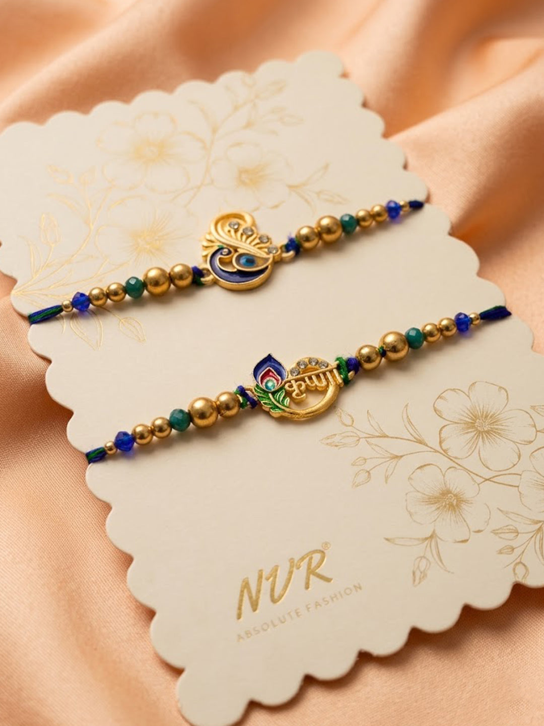 NVR Set of 2 Krishna & Peacock Design Artificial Beads Thread Rakhi With Roli Chawal