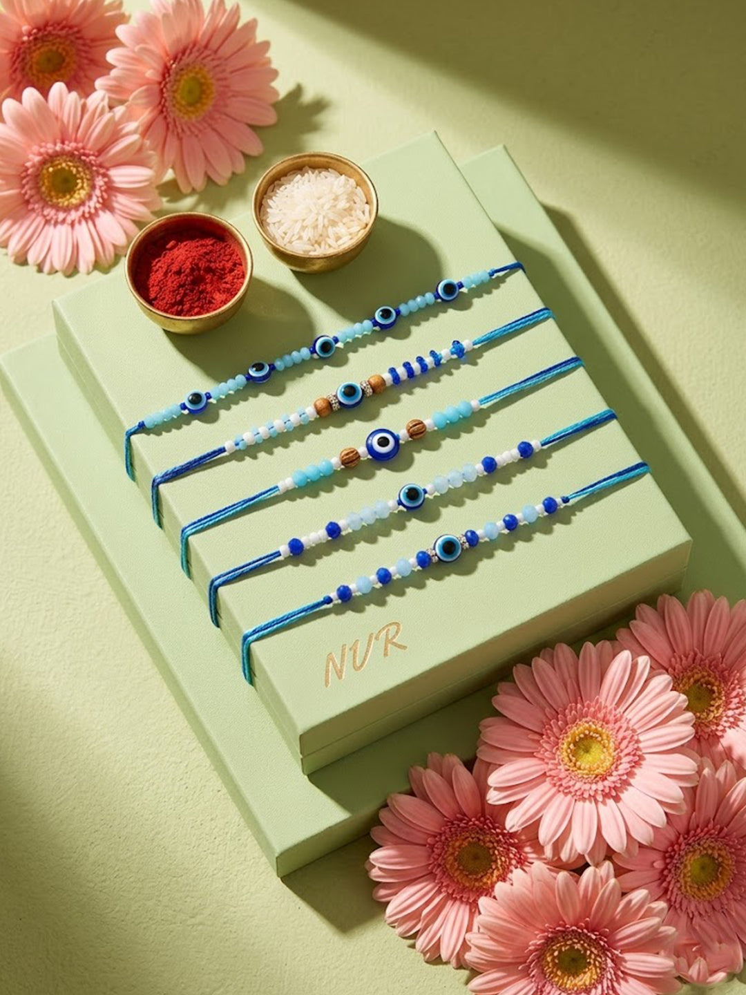 NVR Set of 5 Blue Evil Eye Thread Rakhi with Roli Chawal Chandan Mishri