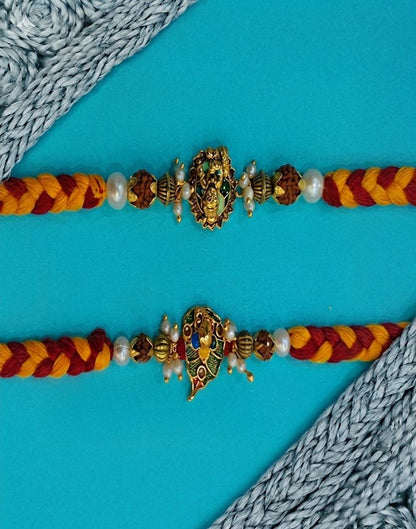 NVR Set of 2 Pearls Religious Thread Rakhi with Roli Chawal Chandan Mishri