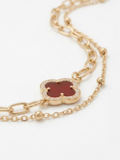 NVR Women Artrificial Stones Gold Plated Rakhi with Roli Chawal Chandan Mishri
