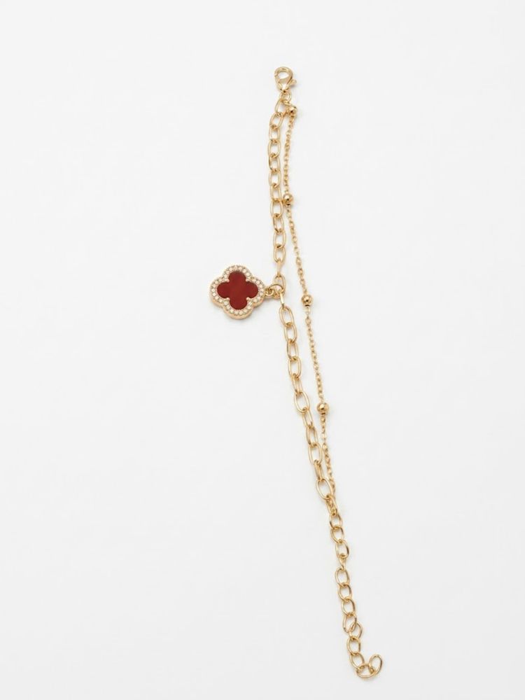 NVR Women Artrificial Stones Gold Plated Rakhi with Roli Chawal Chandan Mishri