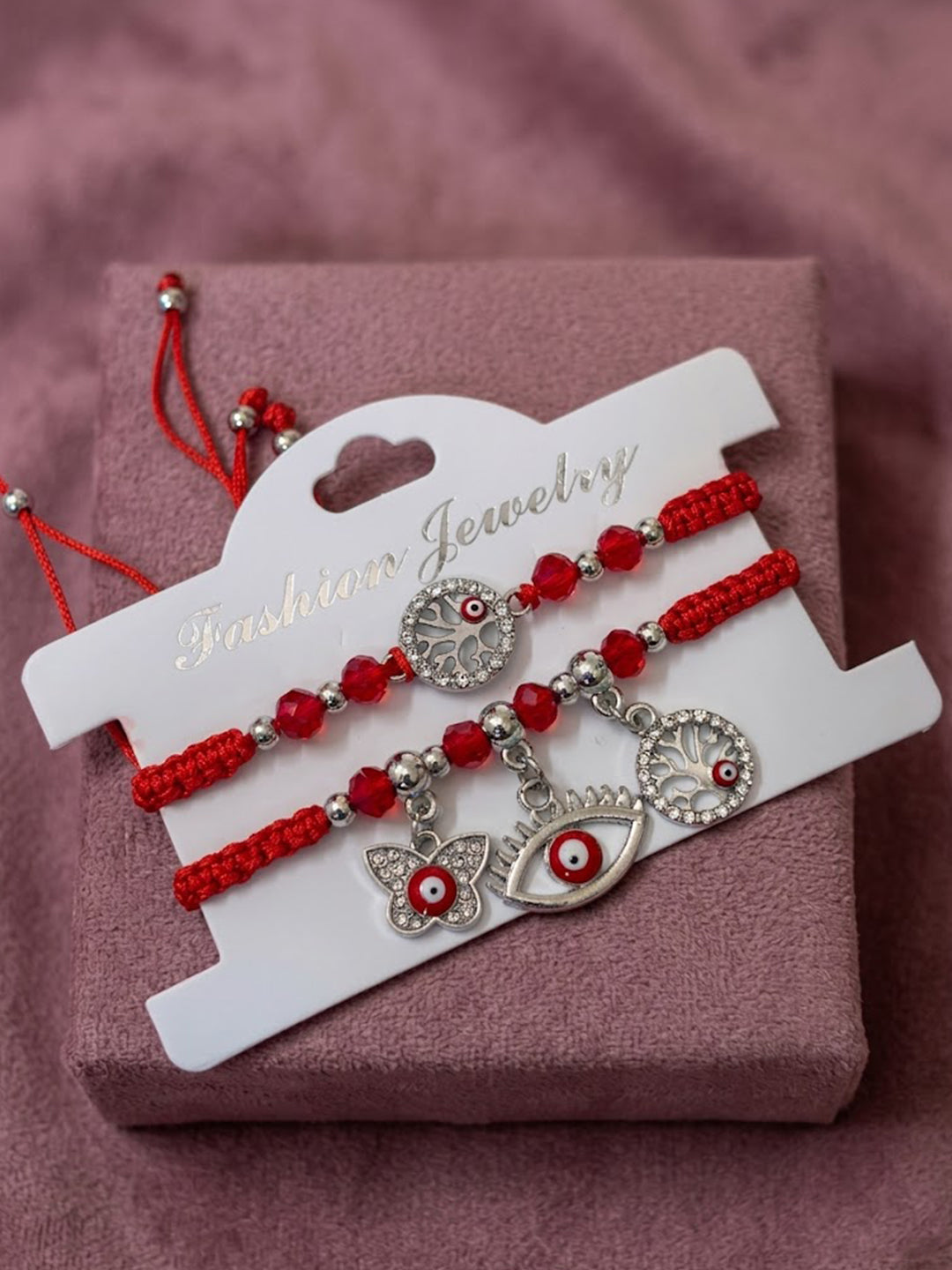 NVR Set of 2 Red & Silver Evil Eye Design Bhaiya Bhabhi Rakhi with Roli Chawal Chandan