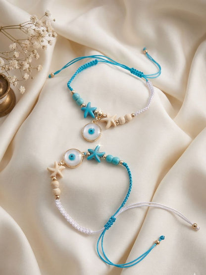 NVR Set of 2 Blue Evil Eye & White Pearl Bhaiya Bhabhi Rakhi with Roli Chawal Chandan