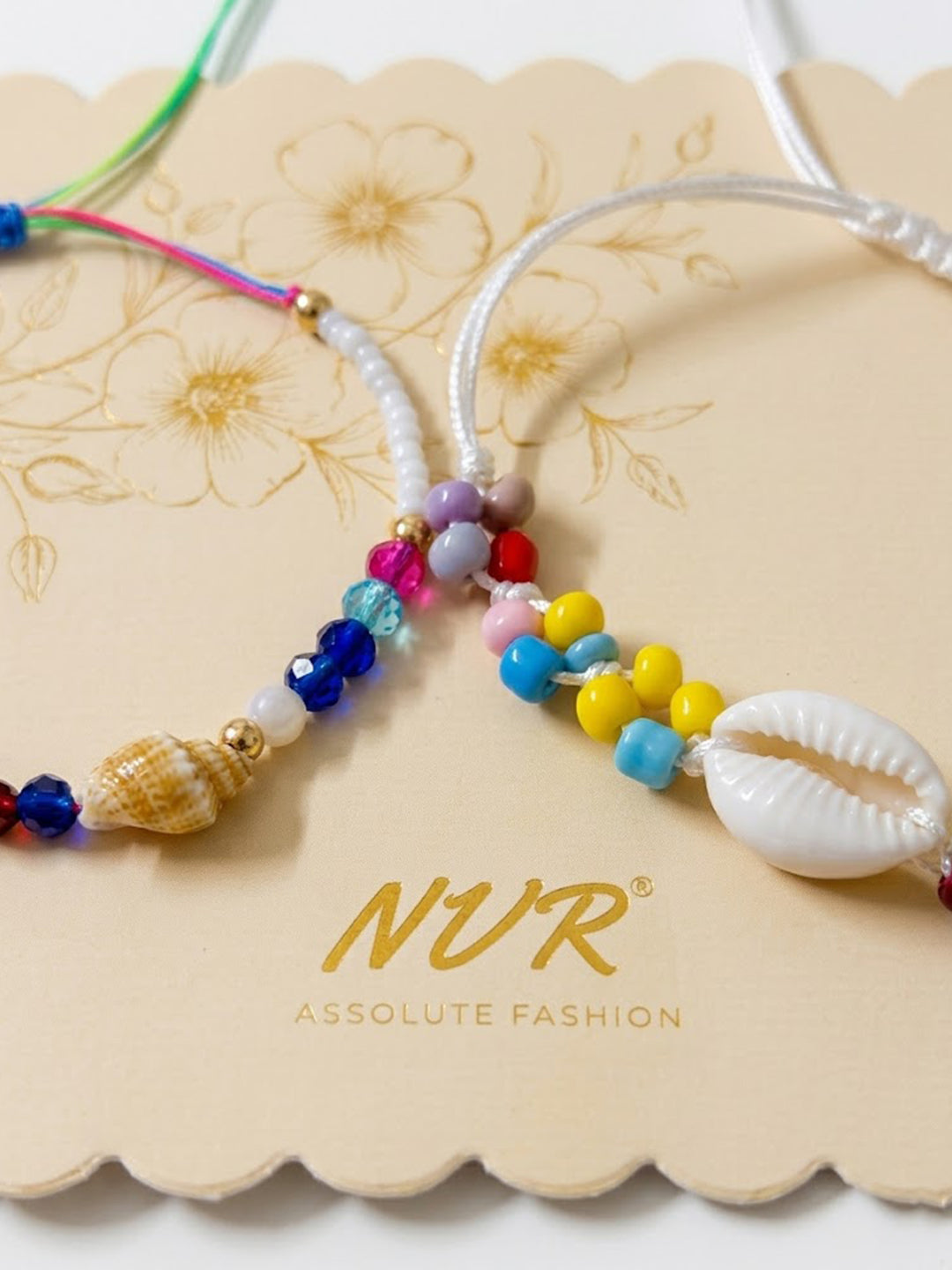 NVR Set of 2 Artificial Beads Thread Rakhi With Roli Chawal Chandan Mishri