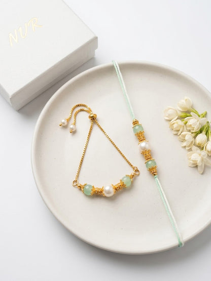 NVR Set of 2 Gold Toned Pearls & Artificial Beads Bhaiya Bhabhi Rakhi with Roli Chawal