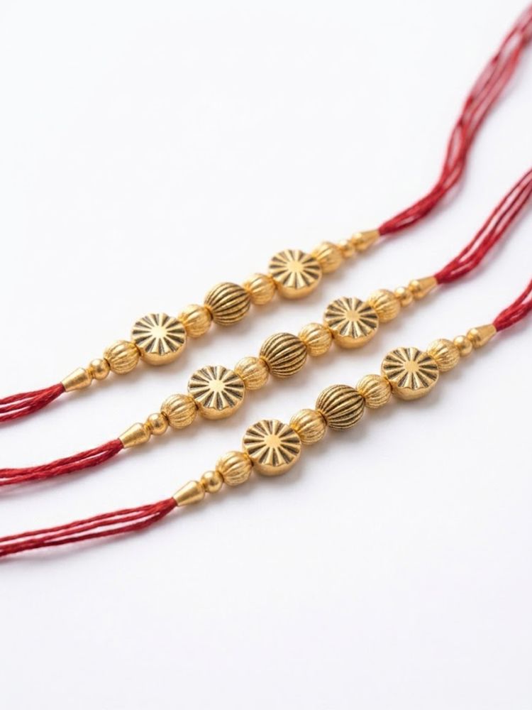 NVR Set of 3 Red & Gold Toned Artificial Stones & Beads Thread Rakhi With Roli Chawal