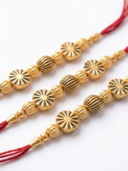 NVR Set of 3 Red & Gold Toned Artificial Stones & Beads Thread Rakhi With Roli Chawal