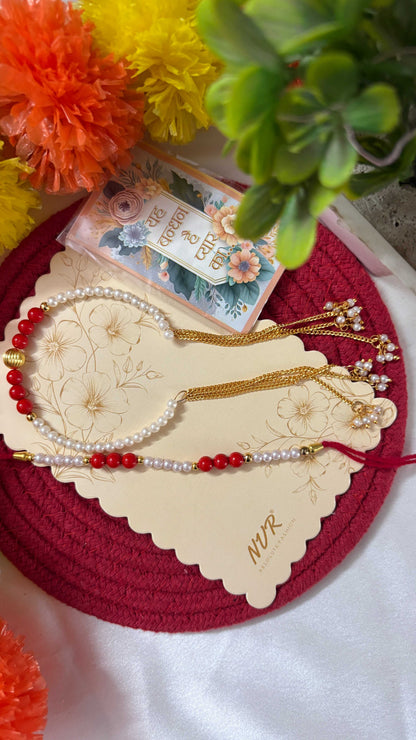 NVR Set of 2 White Pearls & Red Artificial Beads Bhaiya Bhabhi Rakhi with Roli Chawal