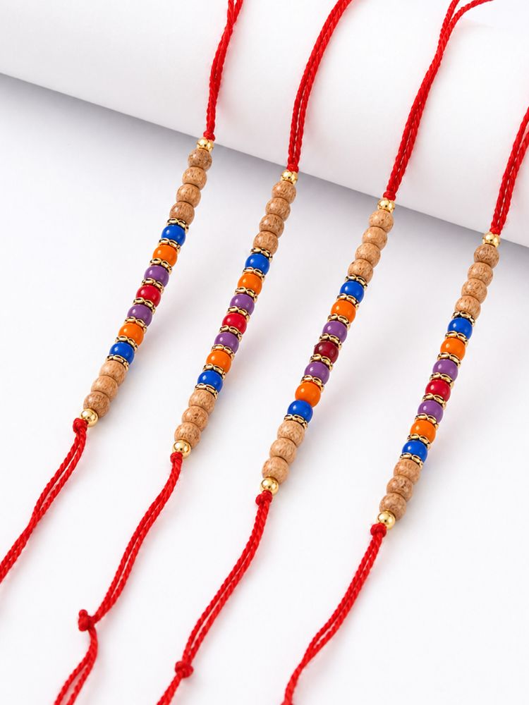 NVR Set of 4 Multicolor Circular Beads Studded Thread Rakhi with Roli Chawal Chandan