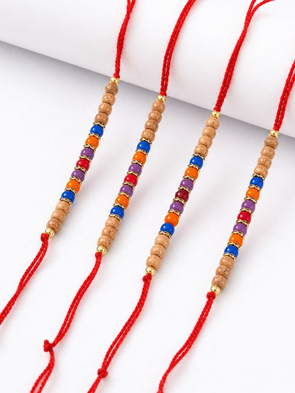 NVR Set of 4 Multicolor Circular Beads Studded Thread Rakhi with Roli Chawal Chandan