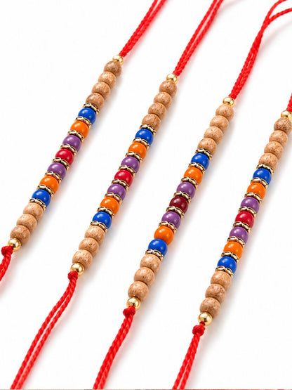 NVR Set of 4 Multicolor Circular Beads Studded Thread Rakhi with Roli Chawal Chandan