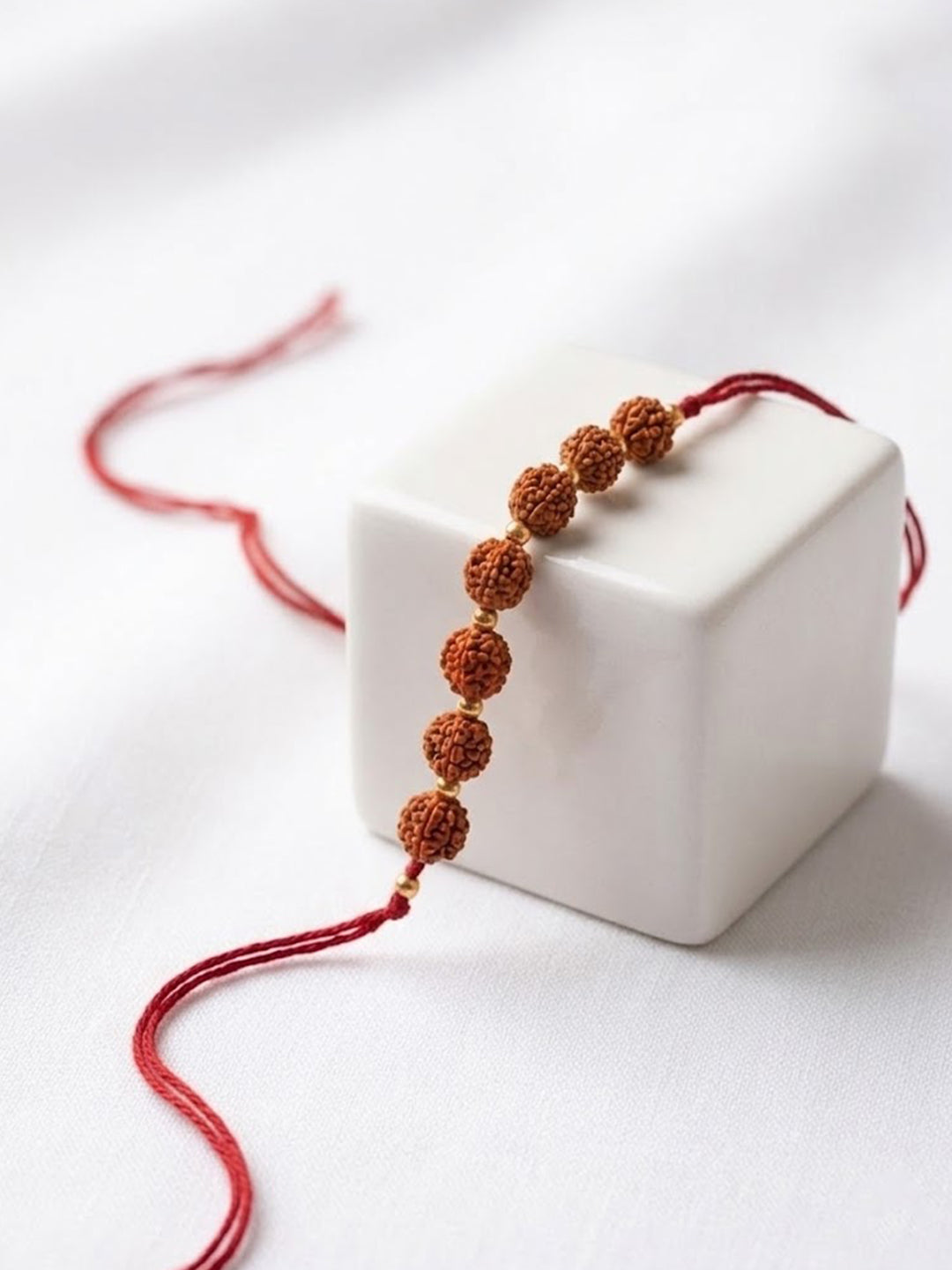 NVR Religious Rudraksh Thread Rakhi With Roli Chawal Chandan Mishri