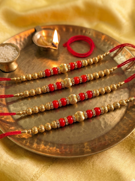 NVR Set of 4 Artificial Beads Red Thread Rakhi With Roli Chawal Chandan Mishri