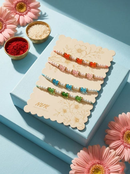 NVR Set of 4 White Pearls & Multicolor Thread Rakhi With Roli Chawal Chandan Mishri