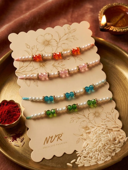 NVR Set of 4 White Pearls & Multicolor Thread Rakhi With Roli Chawal Chandan Mishri