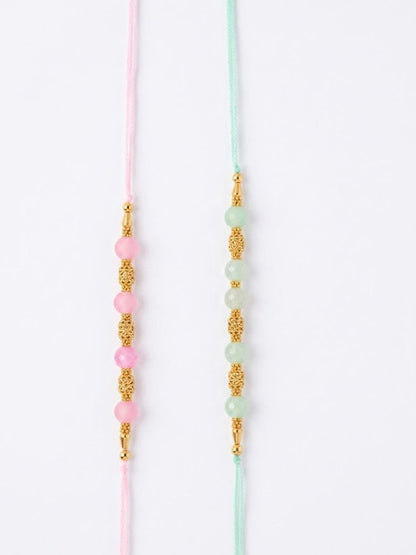 NVR Set of 2 Pink & Green Artificial Beads Thread Rakhi With Roli Chawal Chandan Mishri