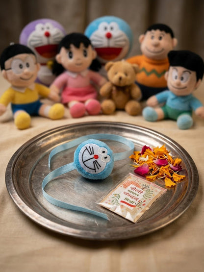 NVR Kids Doremon Design Thread Rakhi With Roli Chawal Chandan Mishri