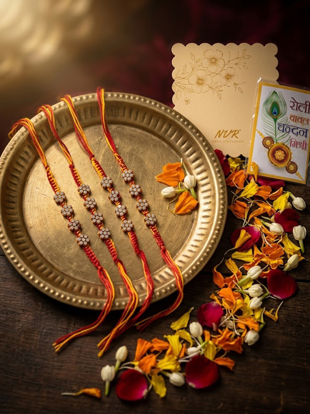 NVR Set of 4 Artificial Stones Floral Design Thread Rakhi with Roli Chawal Chandan Mishri