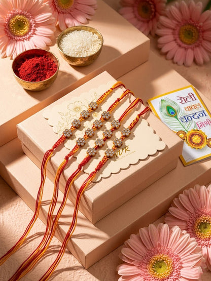 NVR Set of 4 Artificial Stones Floral Design Thread Rakhi with Roli Chawal Chandan Mishri
