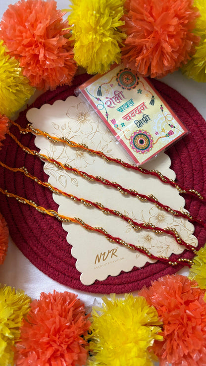 NVR Set of 4 Yellow & Red Thread Rakhi with Roli Chawal Chandan Mishri