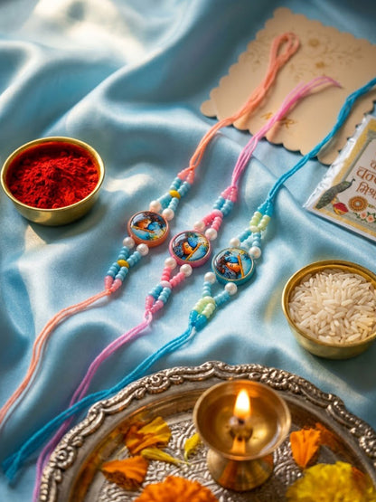 NVR Set of 3 Radha Krishna Thread Rakhi with Roli Chawal Chandan Mishri