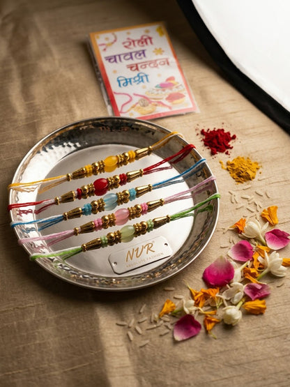 NVR Set of 5 Multi Artificial Beads Thread Rakhi with Roli Chawal Chandan Mishri