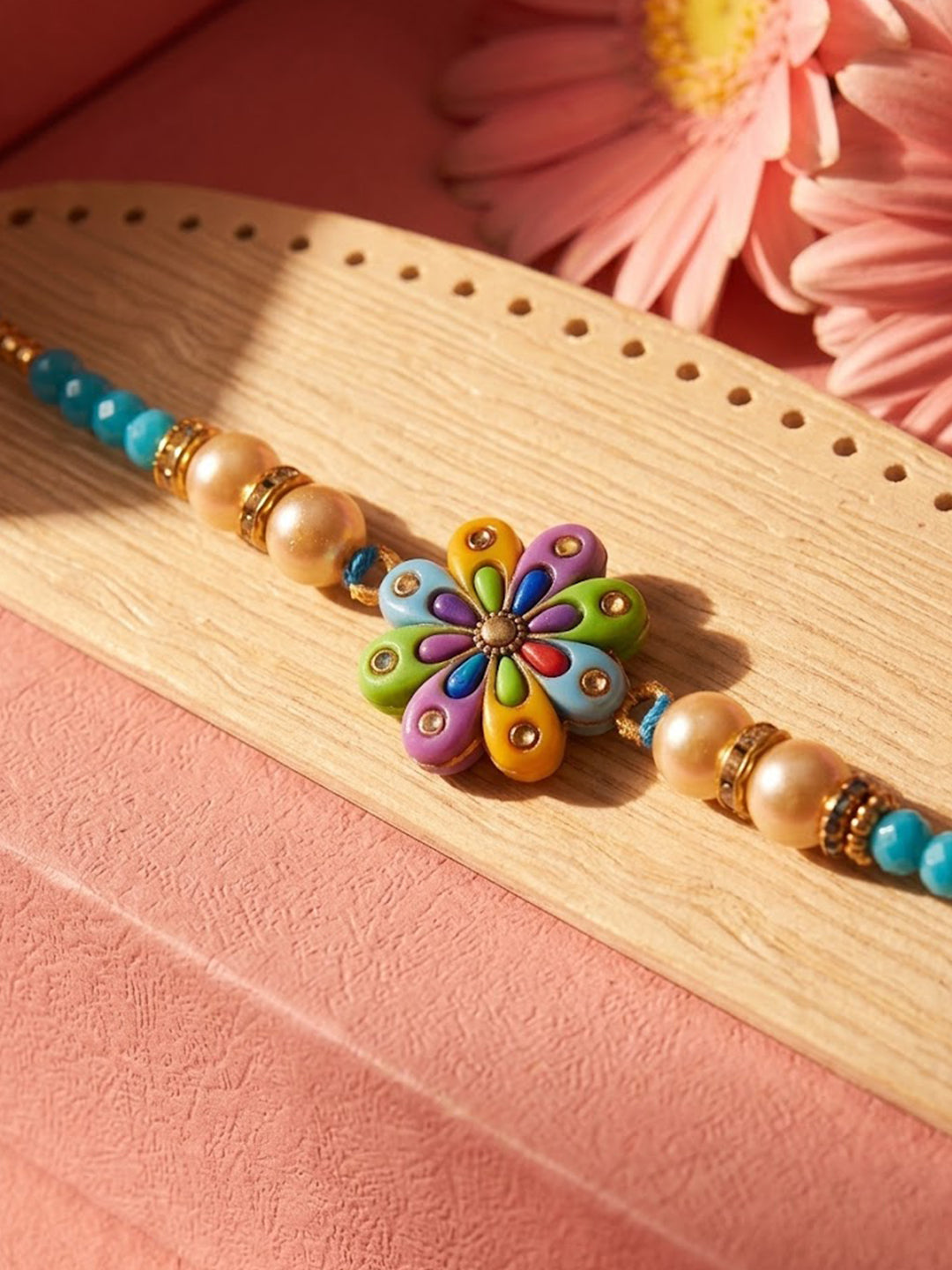NVR Artificial Beads Flower Shape Multicolor Thread Rakhi with Roli Chawal Chandan Mishri