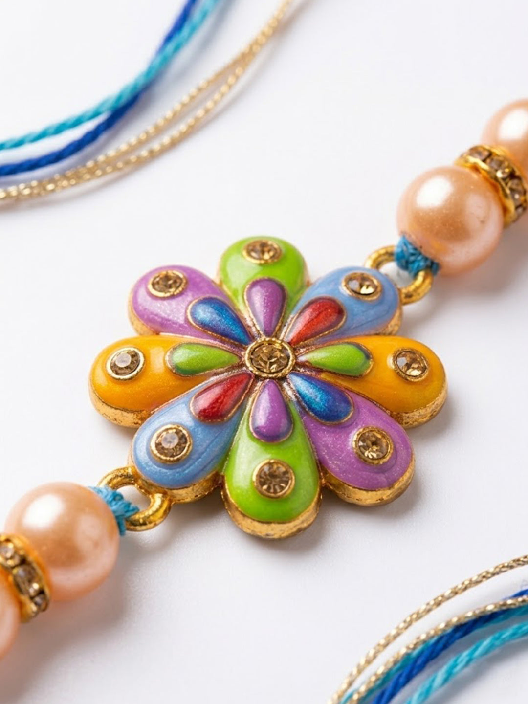 NVR Artificial Beads Flower Shape Multicolor Thread Rakhi with Roli Chawal Chandan Mishri