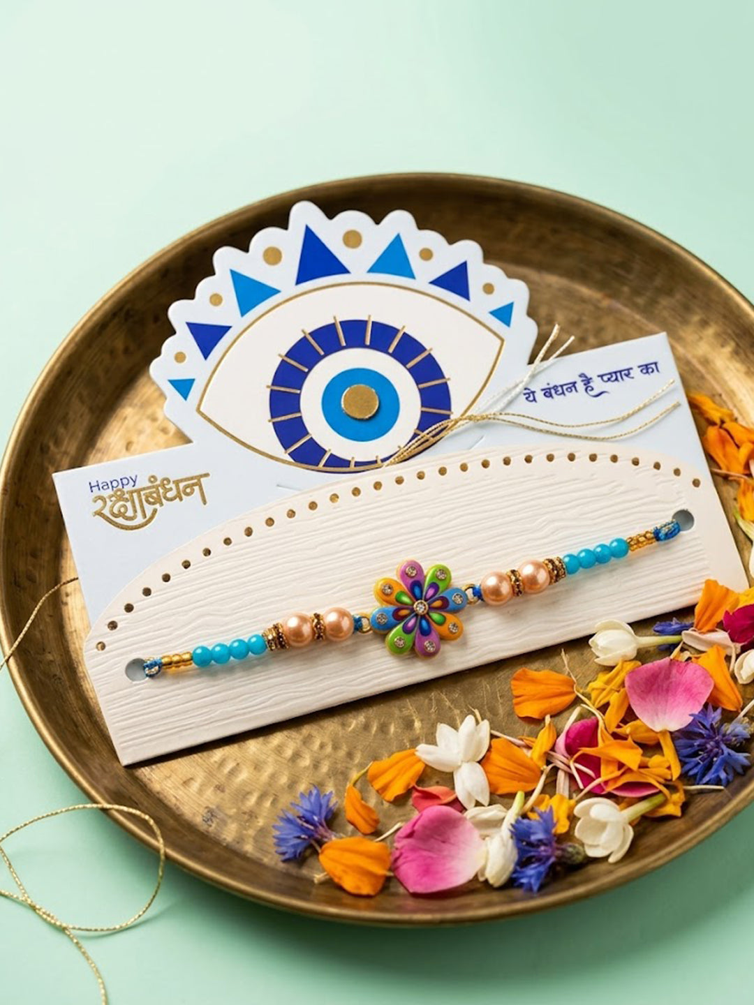 NVR Artificial Beads Flower Shape Multicolor Thread Rakhi with Roli Chawal Chandan Mishri