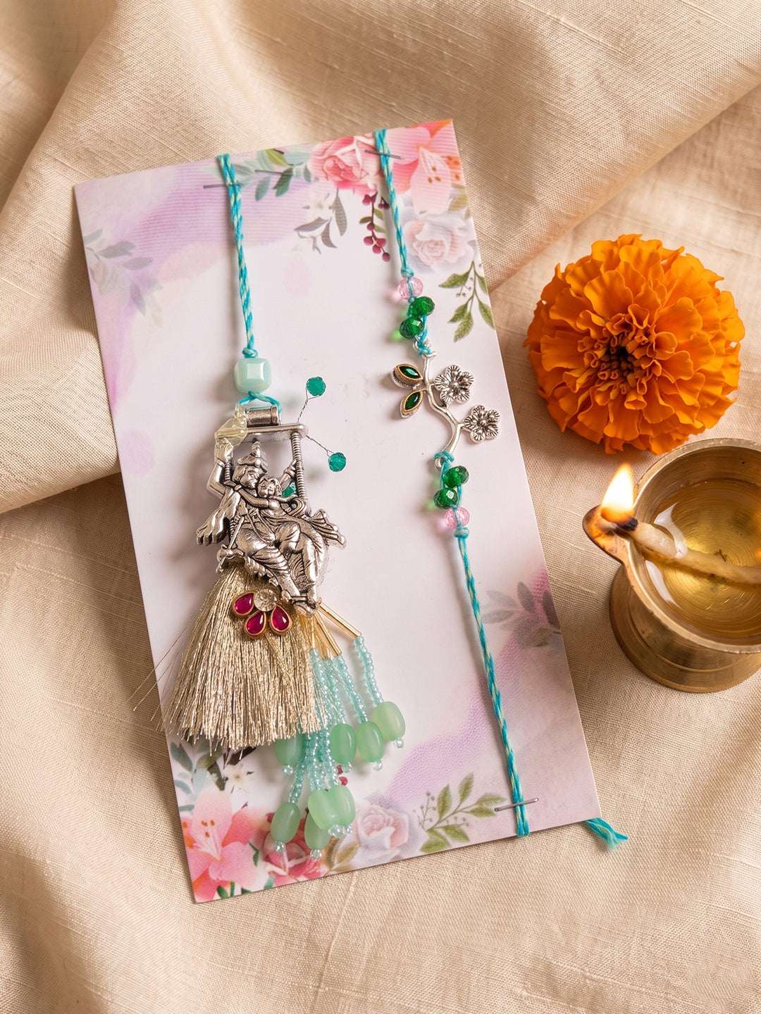 NVR Set of 2 Designer Religious Silver Toned Bhaiya Bhabhi Rakhi with Roli Chawal Chandan